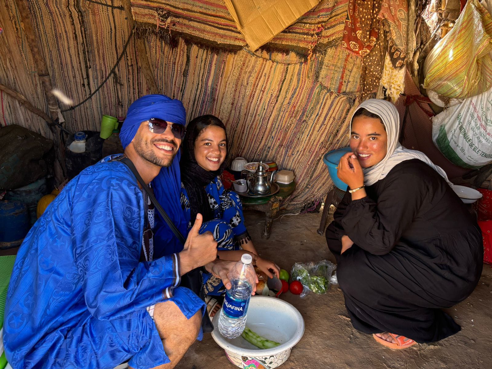 Sharing mint tea and hospitality in a desert tent