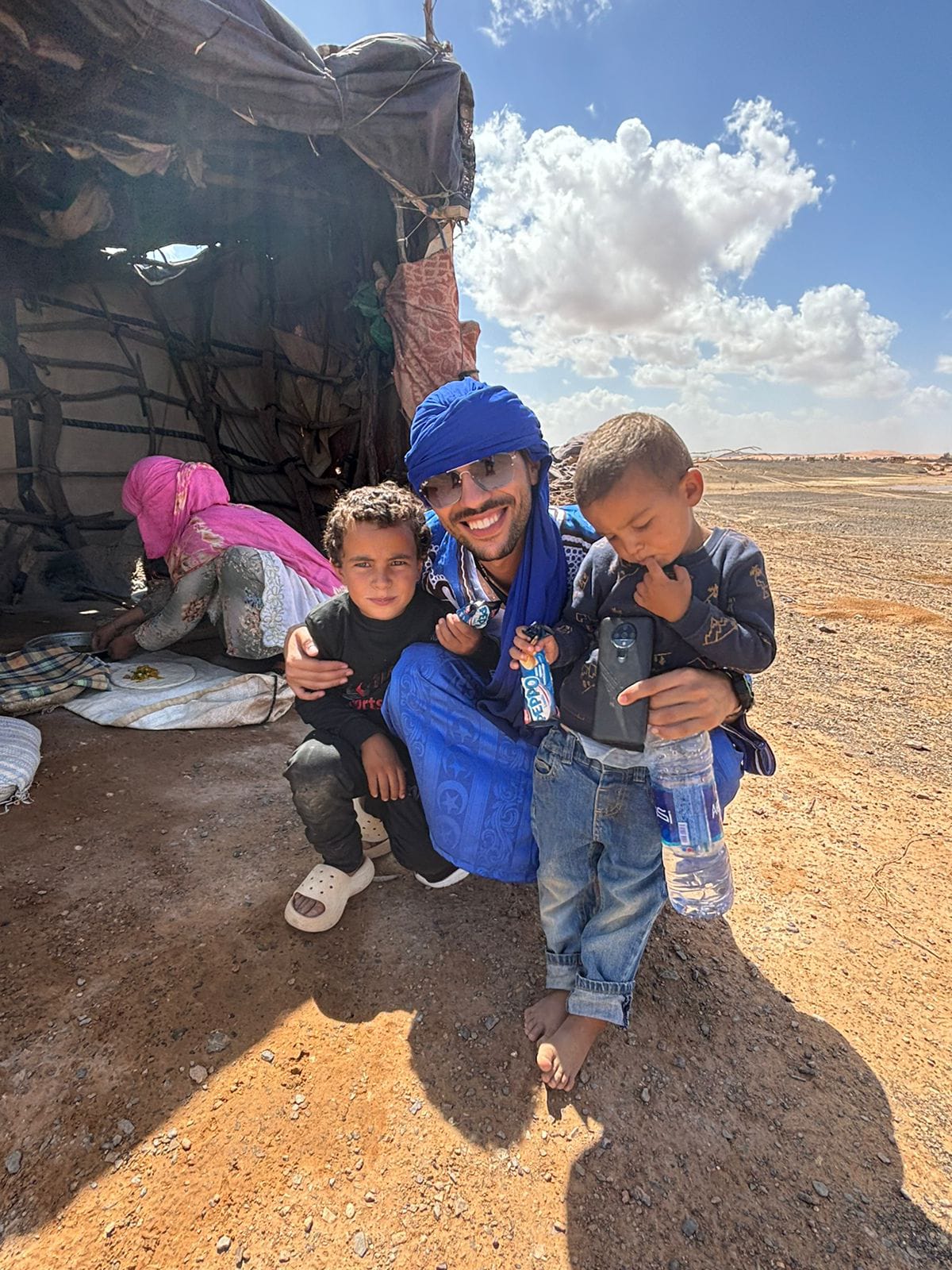 Warm welcome with local families in the desert